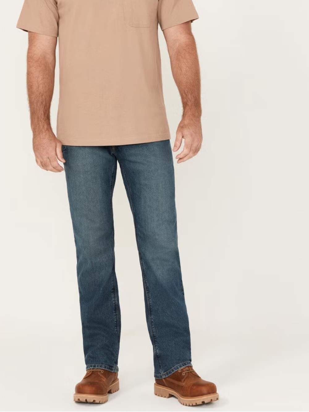 The Ariat Men's M4 Rebar Distressed Low Rise Relaxed Bootcut Work Jeans